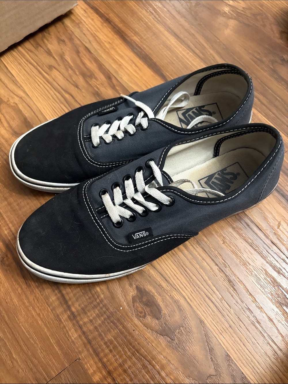 Vans women’s Canvas Low-Top Sneakers - Black with White Accents
